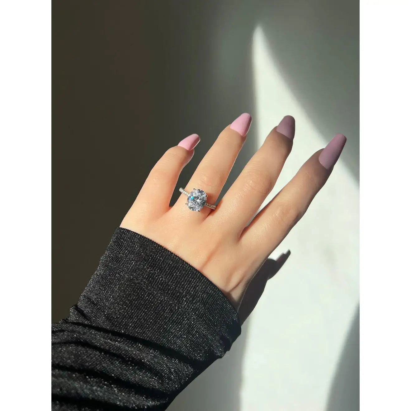 Serenade oval CZ ring worn on finger — 925 sterling silver, statement white stone ring for women