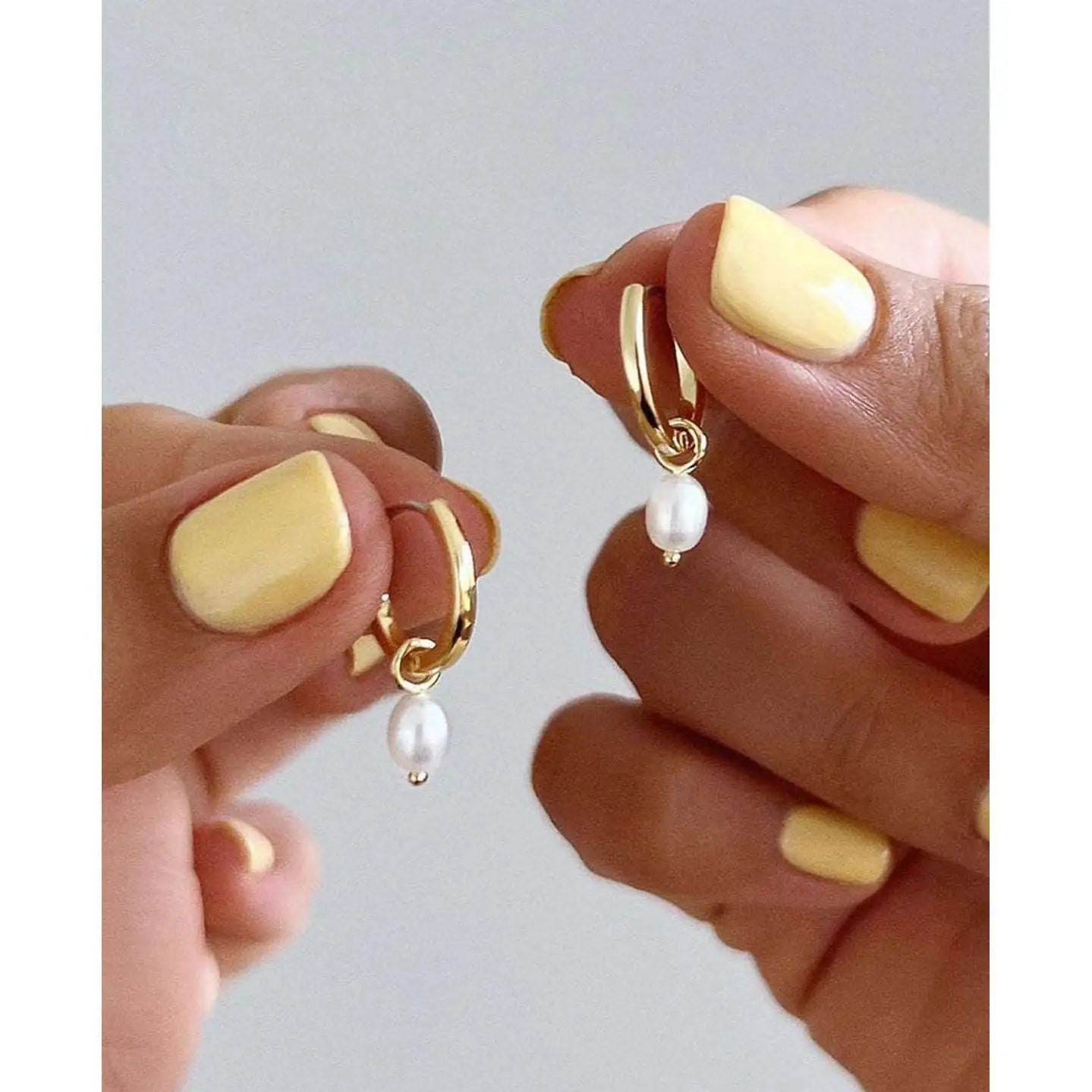 Gold plated drop earrings close-up — 925 silver, lightweight everyday earrings