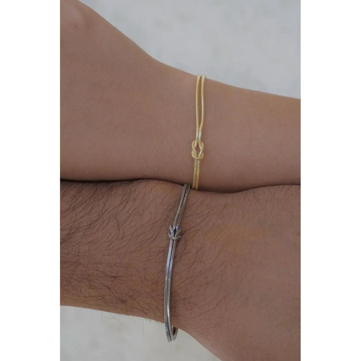 The Bond Set couple bracelet set lifestyle shot — UNJELLIC premium silver jewellery gift packaging