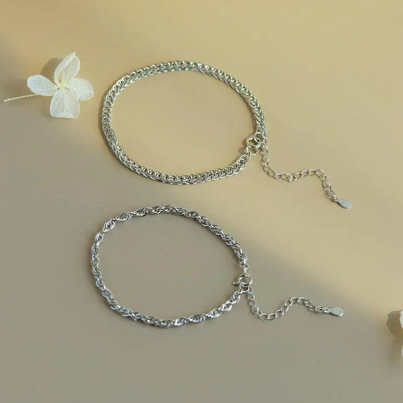 Couple wearing The Knot Set matching 925 sterling silver bracelets with knot charm — romantic gift India