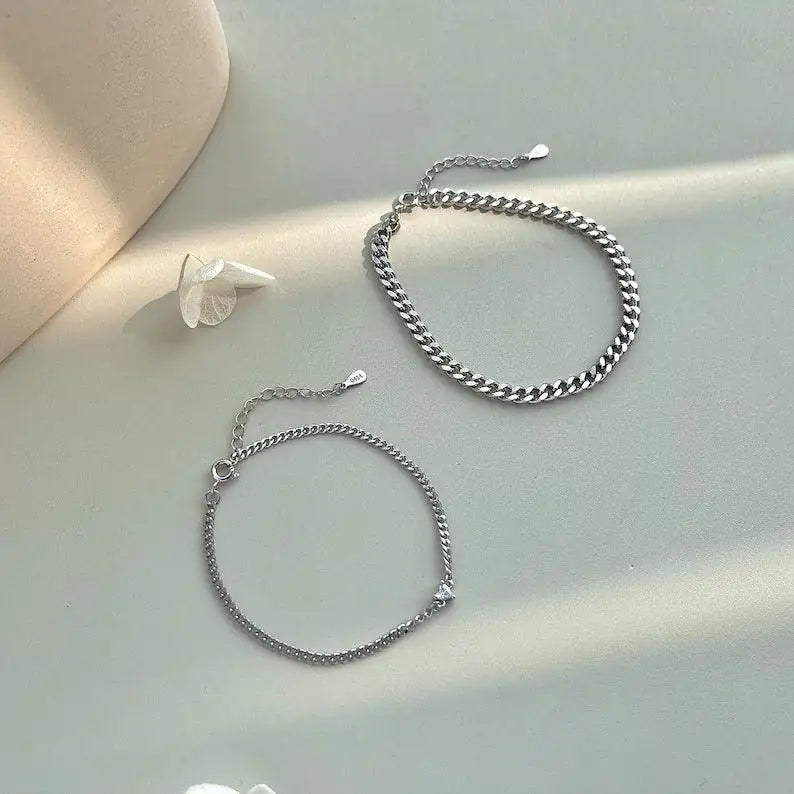 The Mirror Set couple bracelets flat lay — 925 sterling silver matching pair, gift-boxed India