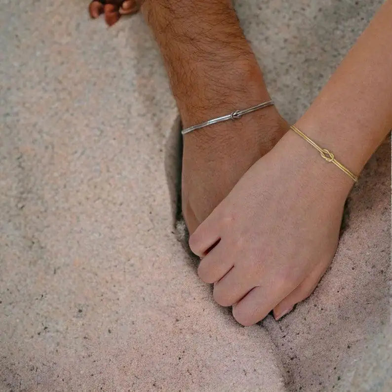 The Bond Set bracelets — silver and gold couple bracelets included in The Bond Edition