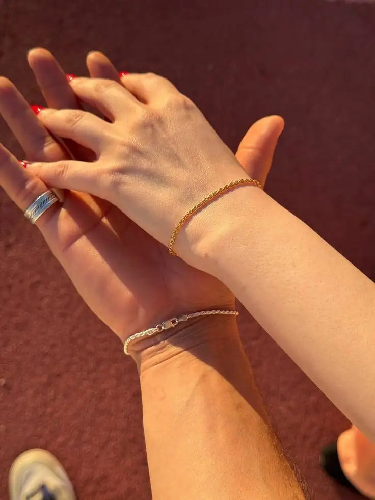 Close-up of The Tether Set 925 silver couple bracelets — minimal chain design, adjustable fit