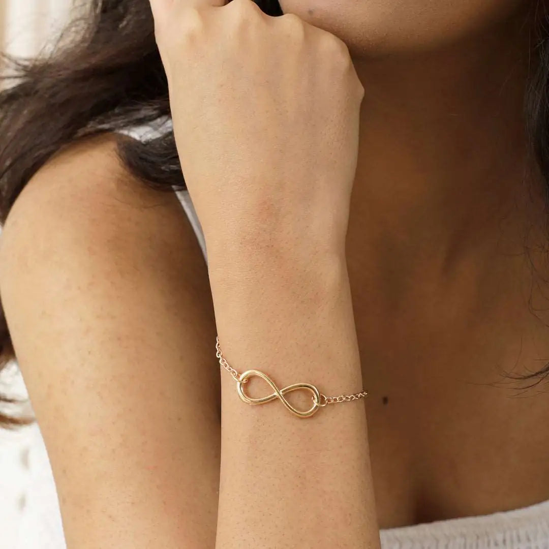 UNJELLIC gold infinity bracelet in premium gift packaging — 925 sterling silver women's bracelet India