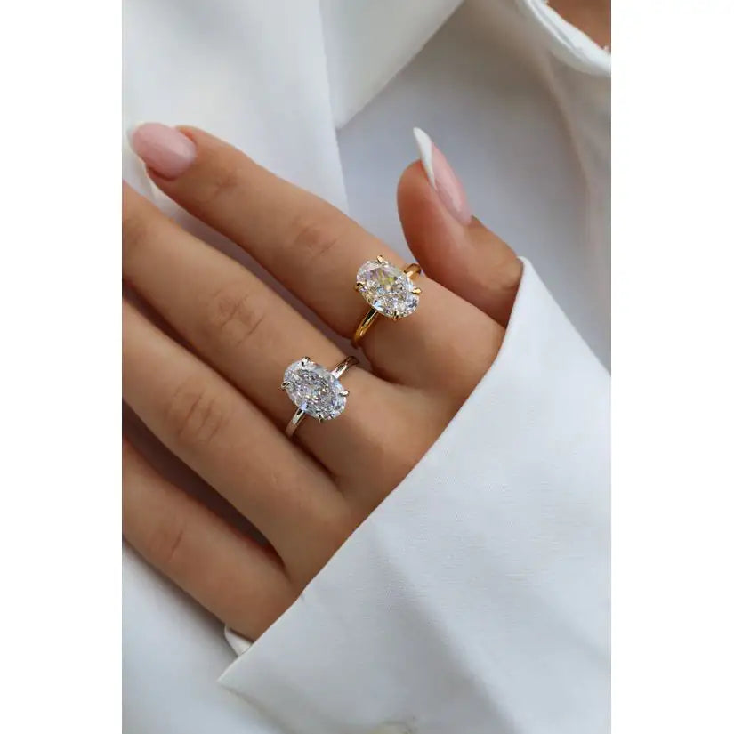 Charlette 925 silver oval ring worn on hand — minimalist stackable band