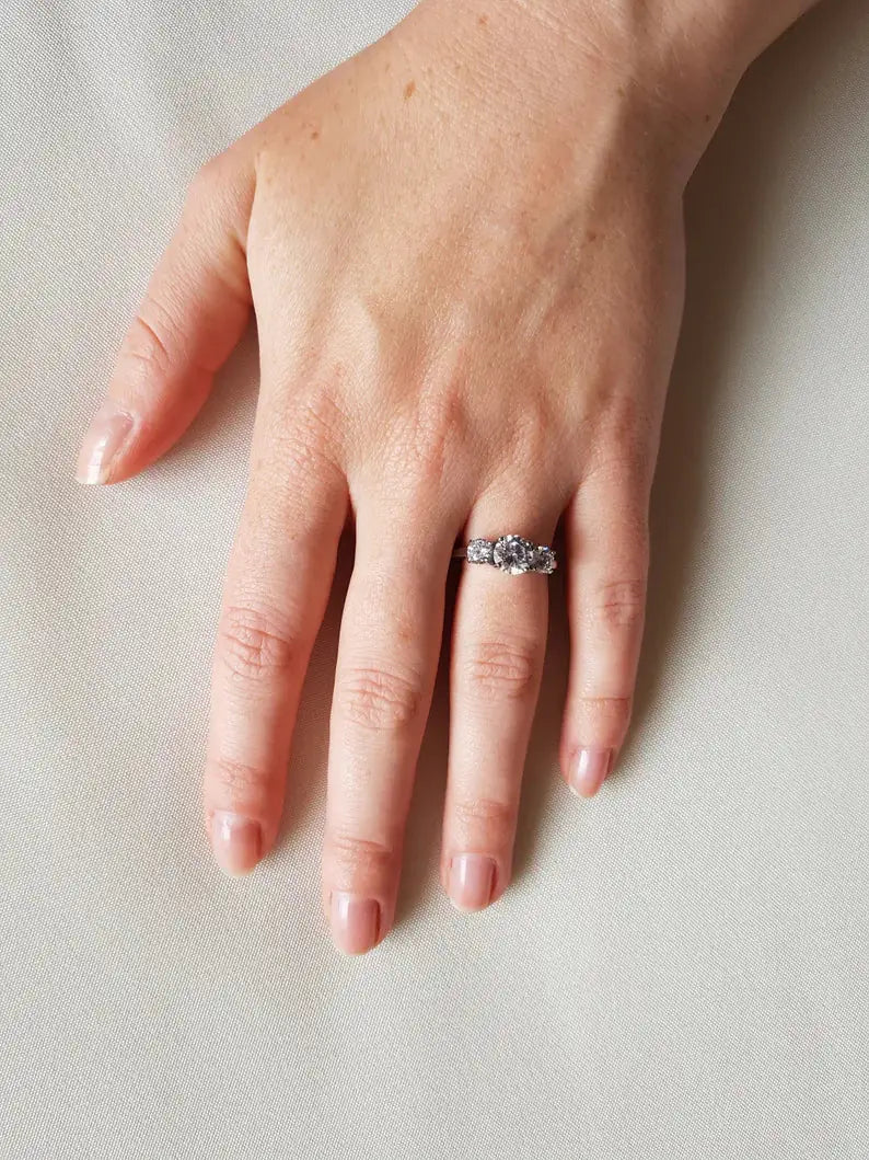 925 silver triple stone ring flat lay — past present future ring, gift-ready box, UNJELLIC India